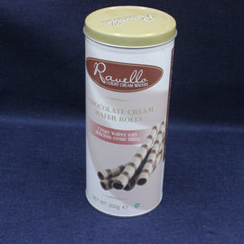 Canister of Ravello chocolate cream wafer rolls on a dark blue background