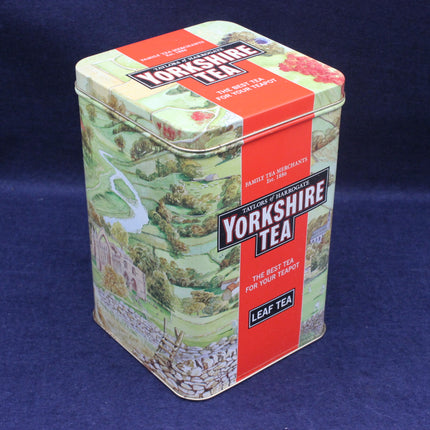 Yorkshire Tea tin box with scenic design on a blue background