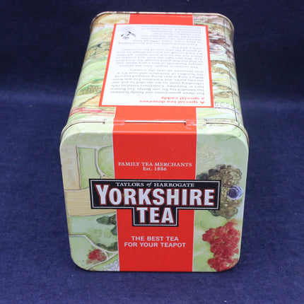 Yorkshire Tea tin on a blue background
