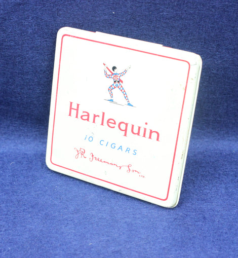Harlequin brand cigar tin on a blue background