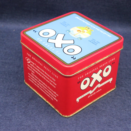 Red OXO tin box on a dark blue background