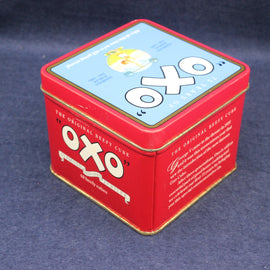 Red OXO tin on a dark blue background