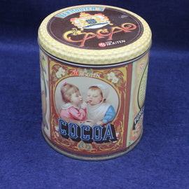 Van Houten cocoa tin with vintage design on a blue background