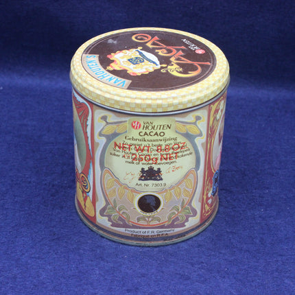 Van Houten cacao tin on a blue background