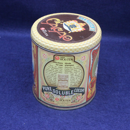 Van Houten pure soluble cocoa canister on a blue background