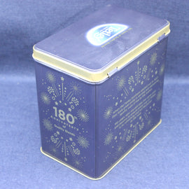 Blue tin box with gold accents and 'Nivea' branding on a blue background