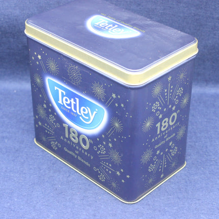 Tetley tea tin with 180th anniversary design on a blue background