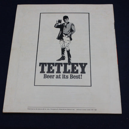 Vintage Tetley beer advertisement with a graphic of a man and text on a white background.