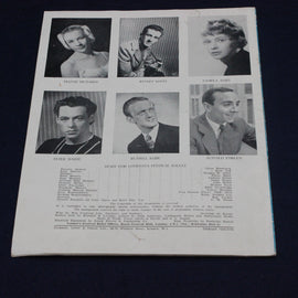 Vintage sheet with black and white portraits and names of staff members from London's Festival Ballet.