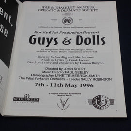 Playbill for 'Guys & Dolls' production by Idle & Thackley Amateur Operatic & Dramatic Society, 1996.