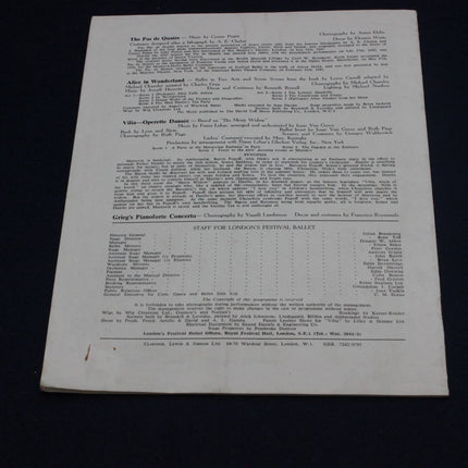 Sheet of paper with printed text on a black background