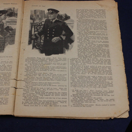 Open book with a black and white illustration of a man in uniform on a dark background