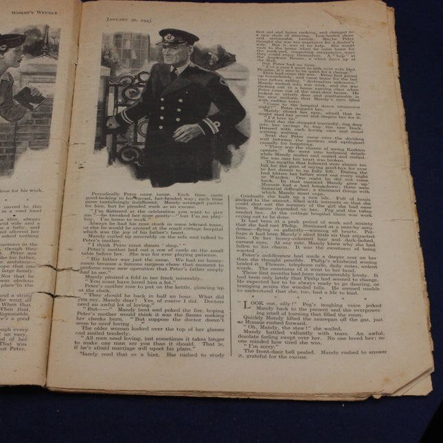 Open book with a black and white illustration of a man in uniform on a dark background