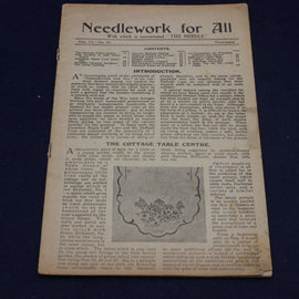 Vintage magazine or book titled 'Needlework for All' on a dark background