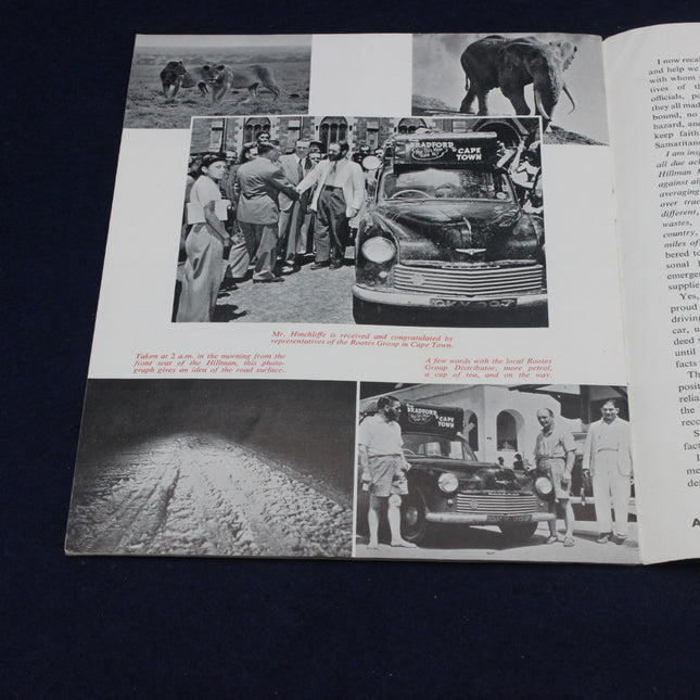Open book with black and white photographs of people, a car, and animals on a dark background