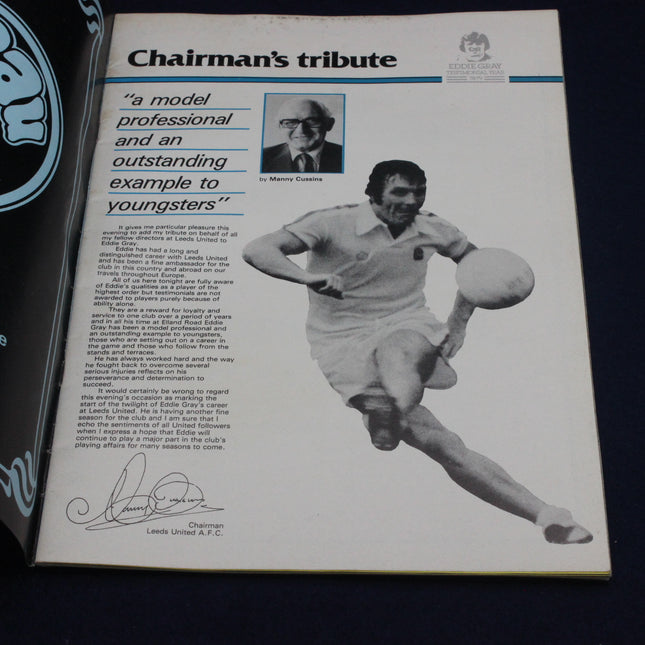 Chairman's tribute document with a black and white photo of a football player and text.