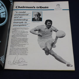 Chairman's tribute document with a black and white photo of a football player and text.