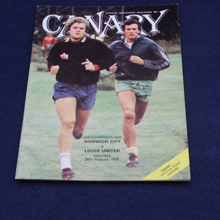 Vintage sports magazine cover featuring two athletes on a grass field with 'Canary' branding.