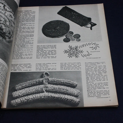 Page from a book with black and white illustrations and text on a dark background