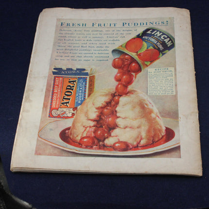 Vintage magazine page with a fruit pudding illustration and product advertisements.
