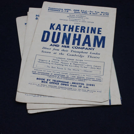 Vintage advertisement for Katherine Dunham and her company on a dark background