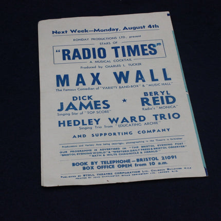Vintage 'Radio Times' poster with entertainment event details on a dark background