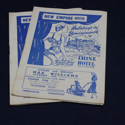 Vintage brochures for New Empire Bristol with blue text and illustrations on a dark background.