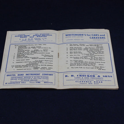 Open New Empire Bristol Programme Flyer with printed text on a dark background