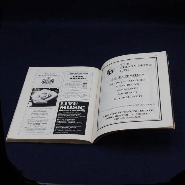 Open Chelsea Flower Show programme showing text and adverts.