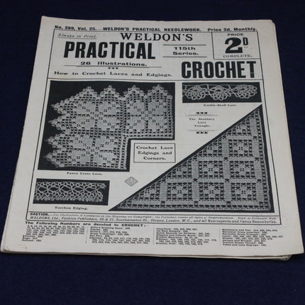 Vintage crochet pattern book with black and white illustrations on a dark background
