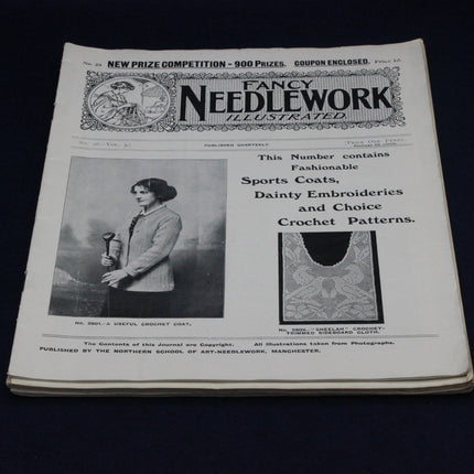 Vintage magazine cover titled 'Fancy Needlework Illustrated' with a woman holding a knitting needle.