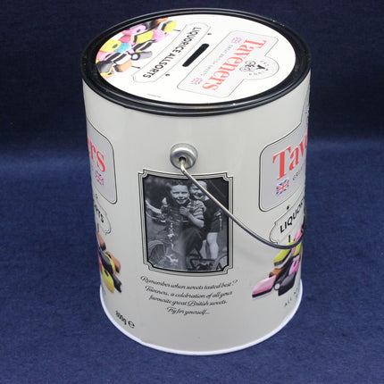 Decorative candy container with a lid featuring colorful graphics and text on a blue background.