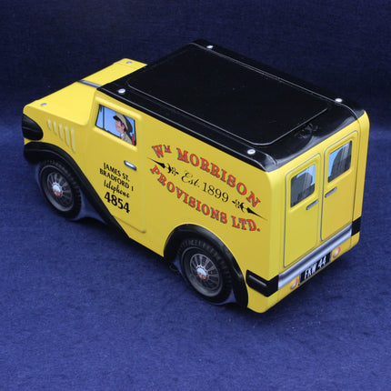 Yellow van model with black roof on a blue background