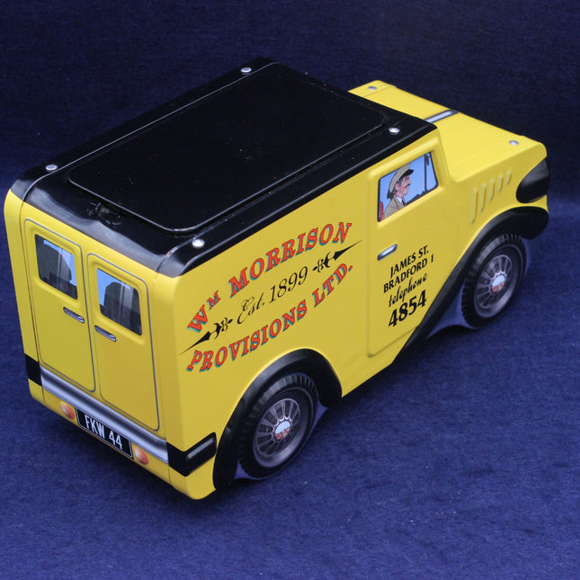 Model of a yellow van with 'W.M. Morrison Provisions Ltd.' branding on a blue background