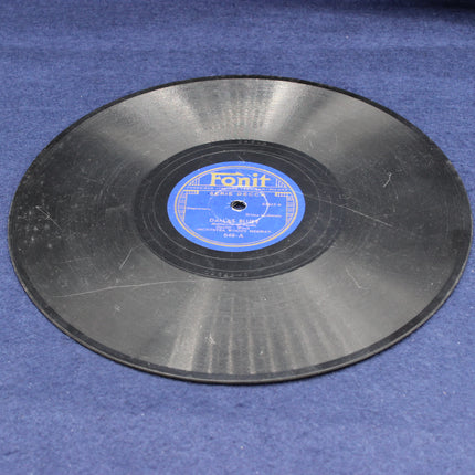 Vintage vinyl record with a blue label on a blue background