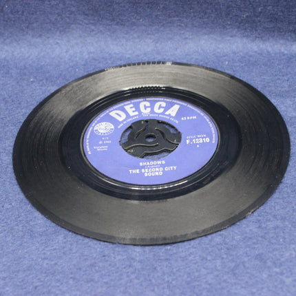 Vinyl record with a blue label on a blue background