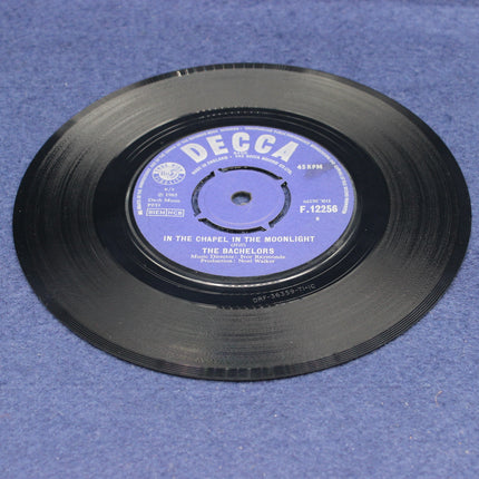 Vinyl record with a blue label on a blue background
