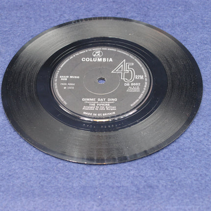 Vinyl record with Columbia label on a blue background