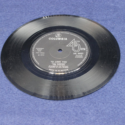 Vinyl record with Columbia label on a blue background