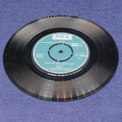 Vinyl record with blue label on a blue background