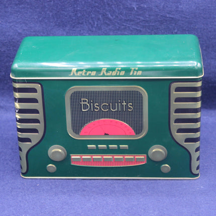 Retro-style teal cookie tin designed like a radio on a blue background