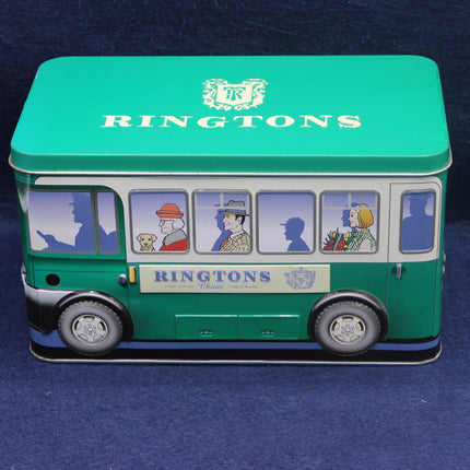 Bus-shaped tin box with 'Ringtons' branding on a blue background