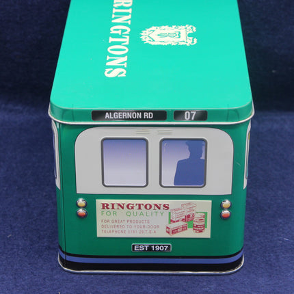 Model of a green bus with 'Ringtons' branding on a blue background