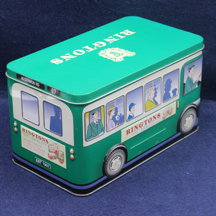 Bus-shaped tin box with 'Ringtons' branding on a blue background