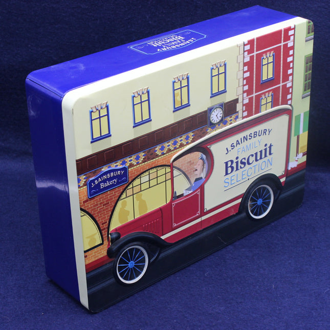 Tin box with vintage Sainsbury's biscuit selection design on a blue background