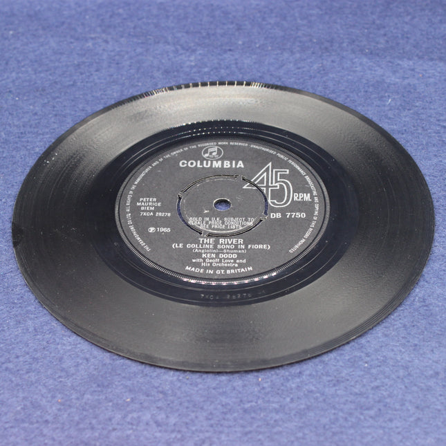 Ken Dodd – The River / Someone Like You 45 RPM vinyl record on a blue surface