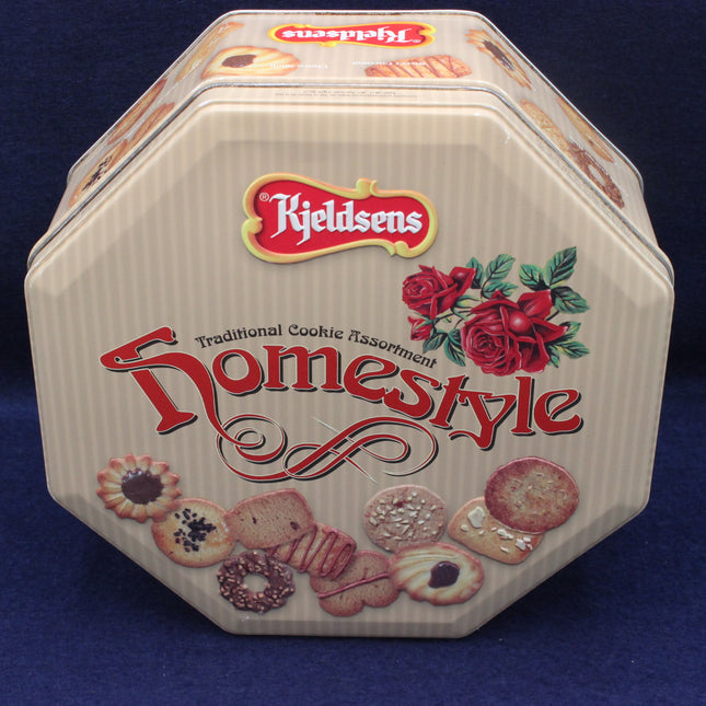 Kjeldsen's Homestyle cookie tin with floral design on a blue background