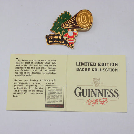 Guinness badge collection with a limited edition badge on a leaflet