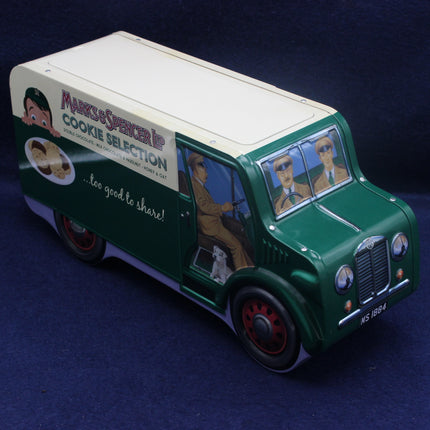 Model of a vintage green van with advertising on a dark blue background