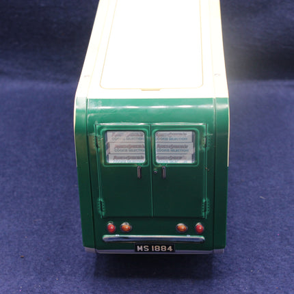 Model of a green bus on a blue background